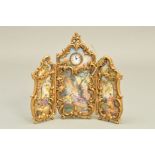 AN EARLY 20TH CENTURY AUSTRIAN VIENNESE GILT METAL AND ENAMEL MINIATURE TRIPTYCH CLOCK, the enamel