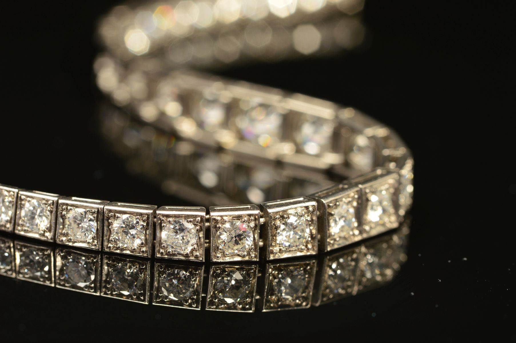 AN ART DECO GRADUATED DIAMOND LINE BRACELET, brilliant cut diamonds, each set to a box setting - Image 5 of 5