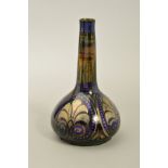 A PILKINGTONS ROYAL LANCASTRIAN POTTERY LUSTRE ONION SHAPED VASE, decorated with silver lustre and
