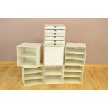 A COLLECTION OF EIGHT PALASET CUBED STORAGE SYSTEMS, comprising of five three tier shelves, six