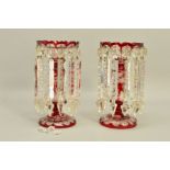 A PAIR OF 19TH CENTURY BOHEMIAN FLASH CUT TABLE LUSTRES, the central columns decorated with stags