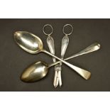 A PAIR OF GEORGE III SILVER OLD ENGLISH PATTERN TABLESPOONS, engraved initials E*Q, makers William