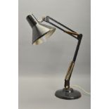 AN EARLY 20TH CENTURY DARK BLUE PAINTED ANGLE POISE STYLE DESK LAMP on a sloped base