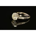 A MID 20TH CENTURY LARGE DIAMOND SINGLE STONE RING, a transitional brilliant cut diamond measuring