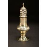 A GEORGE III SILVER CASTER, of baluster form, spiral finial on a pull off domed cover with lattice