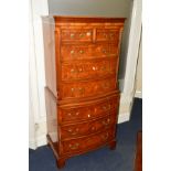 A BEVAN FUNNELL REPRODUX BURR WALNUT SERPENTINE CHEST of two short and six various long drawers,