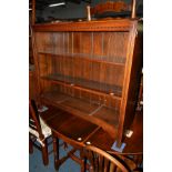 A REPRODUCTION OAK OPEN BOOKCASE, width 106.5cm x depth 30cm x height 94cm