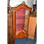 AN EARLY 20TH CENTURY FRENCH WALNUT SINGLE DOOR VITRINE having various brass mounts, on cabriole