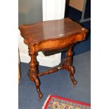A VICTORIAN WALNUT WORK TABLE OF SHAPED RECTANGULAR FORM, hinged top opening to reveal a fitted