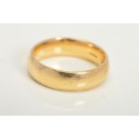A MODERN 9CT GOLD AND RUBY WEDDING BAND, court shaped band measuring approximately 6.0mm in width,
