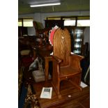 AN OAK GOTHIC CHILDS CHAIR together with an Edwardian metamorphic child's chair (2)