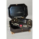 AN ORIENTAL REGENCY STYLE SHAPED OCTAGONAL BLACK LACQUERED AND GILT WORK BOX, fitted interior,