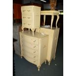 A FIVE PIECE CREAM AND GILT BEDROOM SUITE comprising a tall chest of six drawers, chest of five