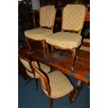 A SET OF SIX 20TH CENTURY OAK DINING CHAIRS