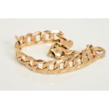 A MODERN 9CT GOLD GENT'S FILED CURB BRACELET measuring approximately 220mm in length, fitted to a