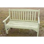 A LIME GREEN PAINTED GARDEN BENCH