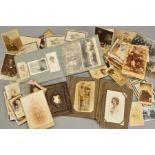 A BOX OF FAMILY PHOTOGRAPHS FROM THE EARLY 20TH CENTURY