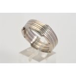 A BI-METAL GENTLEMAN'S RING, designed as a tight coil of alternate metals, the layered edges with