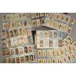 A COLLECTION OF EIGHT HUNDRED AND TWENTY FIVE JOHN PLAYER CIGARETTE CARDS, in twenty sets in one