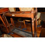 AN EDWARDIAN OAK UMBRELLA STAND with a tin insert, width 73cm x depth 20cm x height 69cm