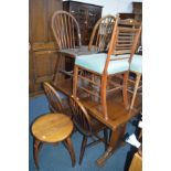 A 20TH CENTURY OAK DRAW LEAF TABLE, six oak stick back chairs, a pair of Edwardian mahogany