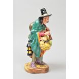 A ROYAL DOULTON FIGURE 'The Mask Seller' HN2103