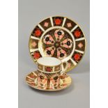 A ROYAL CROWN DERBY OLD IMARI COFFEE CAN AND SAUCER '1128' pattern, together with matching side