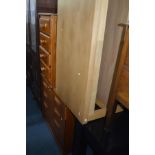 A 1960'S/70'S TEAK CHEST OF FOUR DRAWERS, a pine four drawer bedside cabinet and a beech coffee