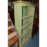 A GREEN PAINTED OPEN BOOKCASE above two short drawers, width 97cm x 33cm x height 181cm, a pine
