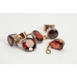 A PAIR OF GARNET DROP EARRINGS AND A PENDANT, the earrings each designed as a collet set circular