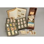 A COLLECTION OF CIGARETTE CARDS, in two albums (box and loose)