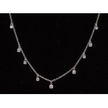 A MODERN 18CT WHITE GOLD, DAINTY DIAMOND FRINGE NECKLET, estimated total diamond weight 0.50ct,