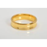A MODERN 18CT YELLOW GOLD WEDDING RING, concaved cross section design, measuring approximately 6mm