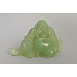 A 20TH CENTURY JADE SEATED BUDDHA, height 7cm x width 12cm