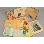 A COLLECTION OF VICTORIAN/EDWARDIAN SCRAPBOOKS AND AUTOGRAPHS, in four albums featuring Christmas,