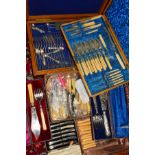 A LATE VICTORIAN OAK CANTEEN OF CUTLERY, assorted contents, together with two cased sets of fish