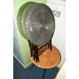 THREE VARIOUS WICKER CIRCULAR FOLDING OCCASIONAL TABLES on a wrought iron frame and another wicker