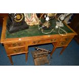 AN EARLY 20TH CENTURY 'GILL AND REIGATE' WALNUT LADIES KNEE HOLE DESK, the top with green leather