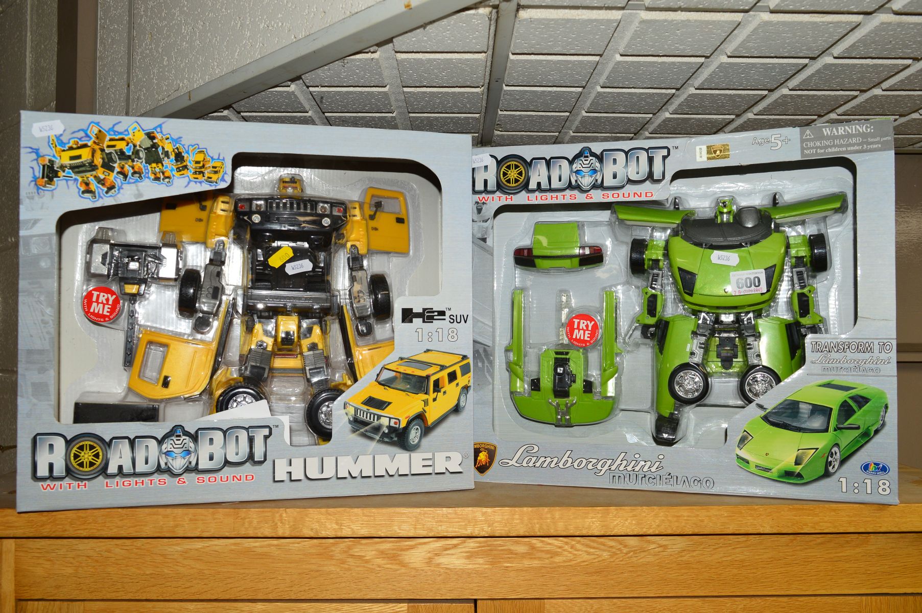 TWO BOXED ROADBOT 1:18 SCALE MODEL VEHICLES, with lights and stands, to include 'Lamborghini' and '