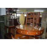 AN EARLY 20TH CENTURY OAK BOBBIN TURNED CANE SEATED STOOL, a mahogany nest of three tables, an oak