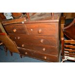 A VICTORIAN STAINED PINE CHEST OF TWO SHORT AND THREE LONG DRAWERS with turned handles on baluster