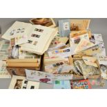 AN ACCULUMATION OF STAMPS AND COVERS, in four boxes including Canada, GB First Day Covers, etc (four