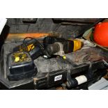 A CASED DEWALT 24V DW005 SDS ROTARY HAMMER DRILL with two batteries and battery charger