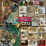 THREE BOXES OF COSTUME JEWELLERY, to include brooches, badges, earrings, necklaces, some gem pieces,