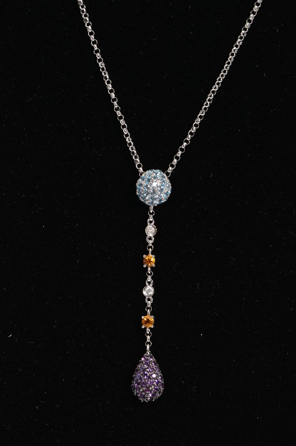 A MODERN 18CT WHITE GOLD MULTI GEMSTONE DROP PENDANT, comprises blue topaz, diamond, citrine and