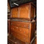 AN OAK LINENFOLD CHEST OF THREE DRAWERS and an oak blanket chest (2)