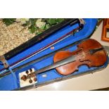 A LATE VICTORIAN/EDWARDIAN VIOLIN, two piece back, no labels, together with a bow and in a coffin