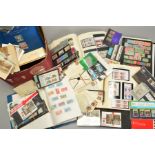 A COLLECTION OF STAMPS, in six albums and loose with British Empire Great Britain in mint blocks,