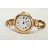 A LARGE OPEN FACE 9CT WRISTWATCH, case measuring approximately 32.0mm, white enamel dial with