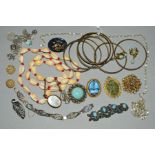 A COLLECTION OF COSTUME JEWELLERY, to include a silver charm bracelet with assorted charms, a